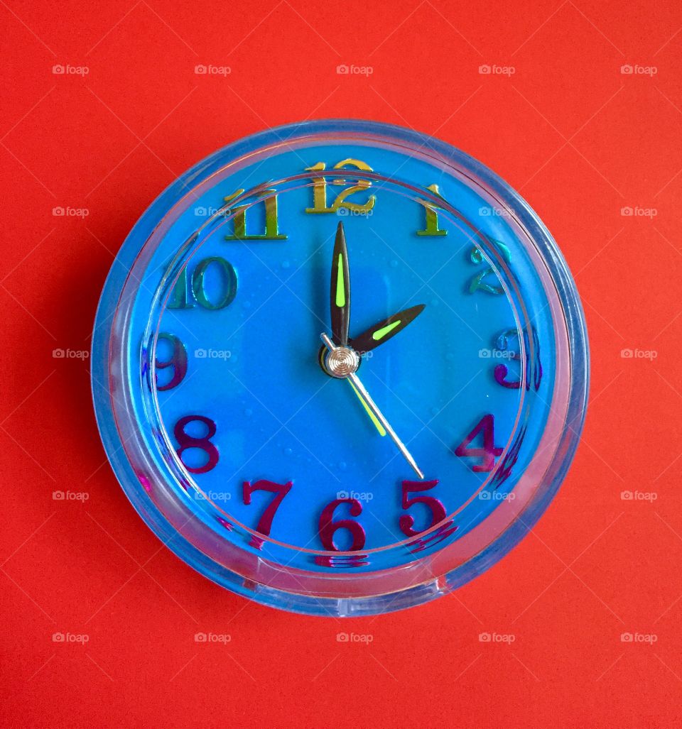 Clock on a red background 