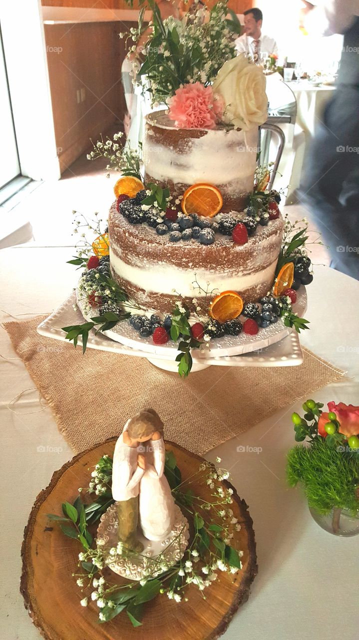 A wedding cake table awaits the bride and groom.