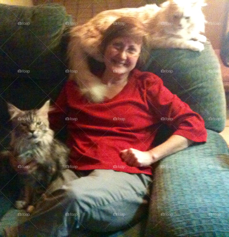 Portrait of woman with cat