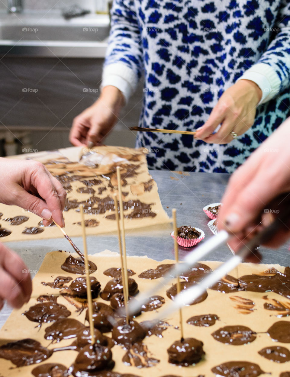 Coating dates with chocolate