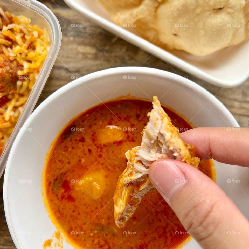 Spicy and delicious chicken mutton dum briyani