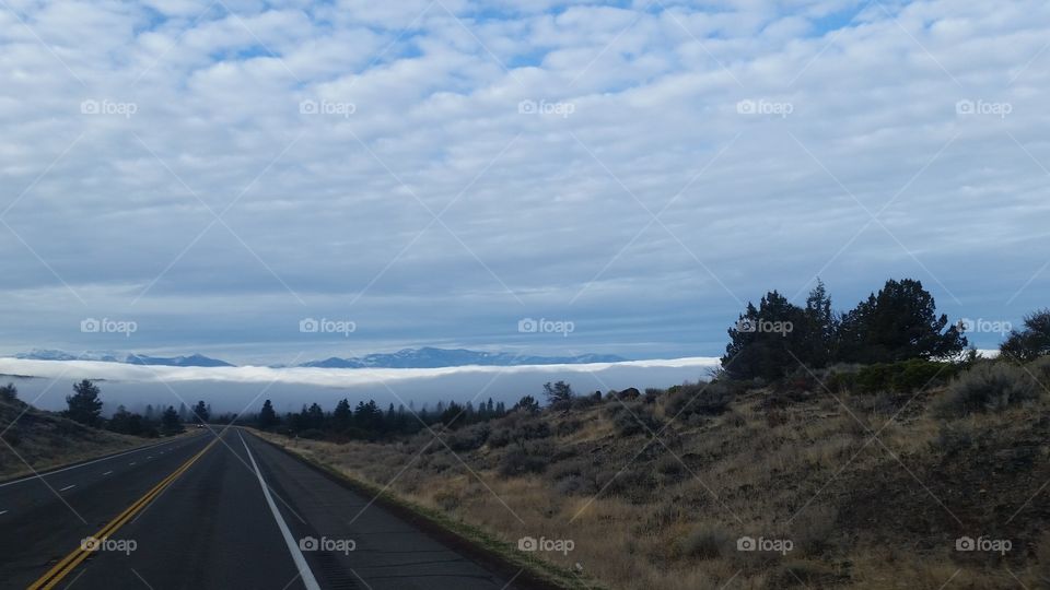 open roads with mysterious clouds