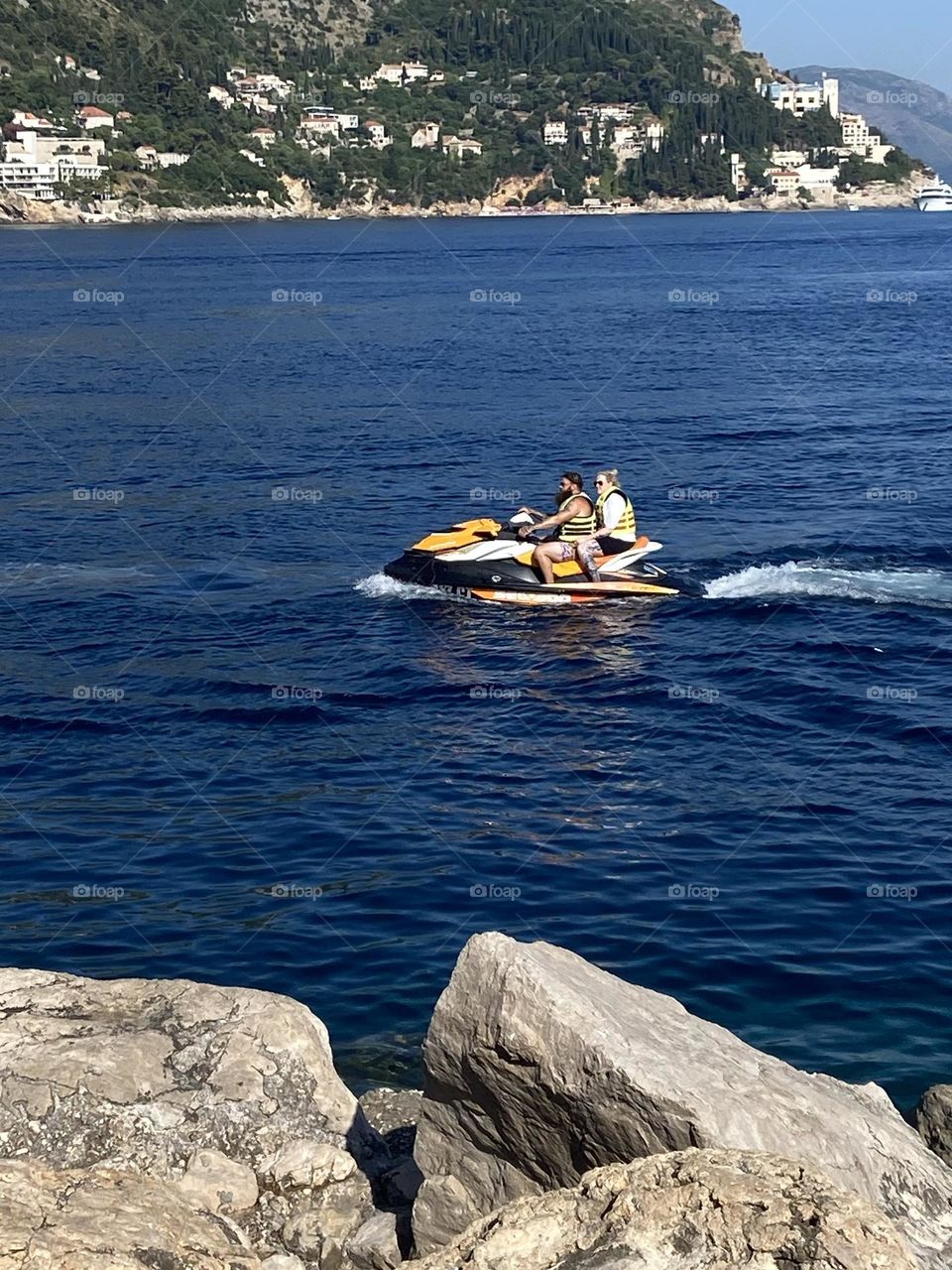 Enjoying a jet ski on a hot summer day in the Adriatic Sea.
