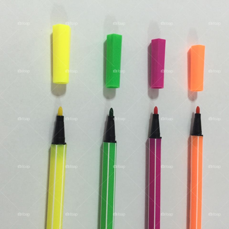Colored markers on the white background great for any use.