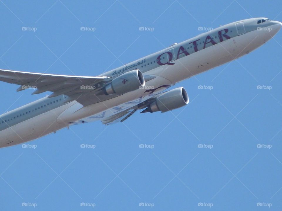Airplane in flight Qatar airways