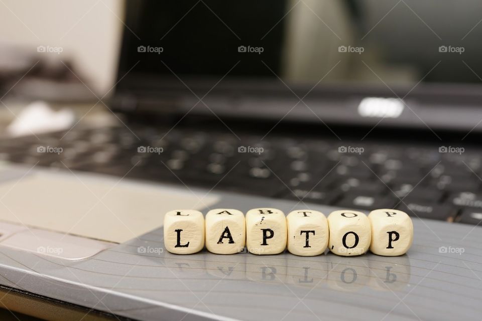 Close-up of laptop text dices