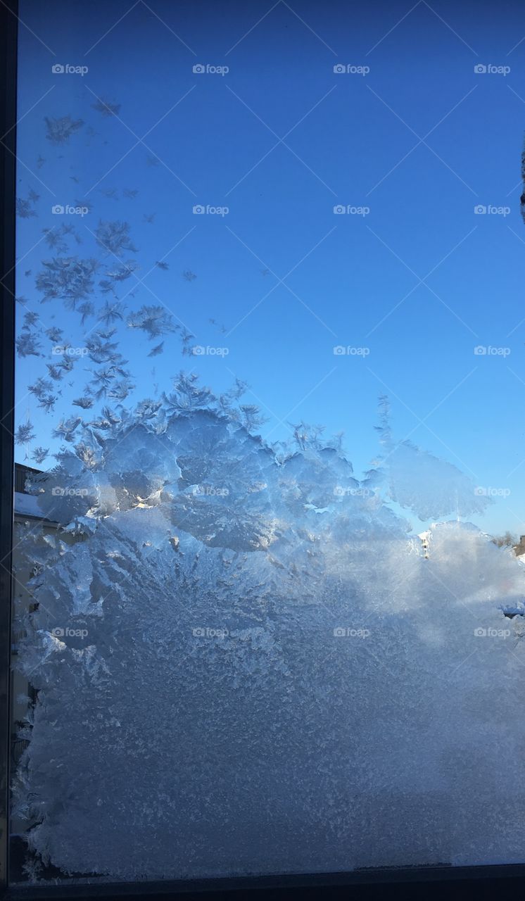 Frozen Glass, Beautiful nature art. Blue sky bring magical look for this picture.