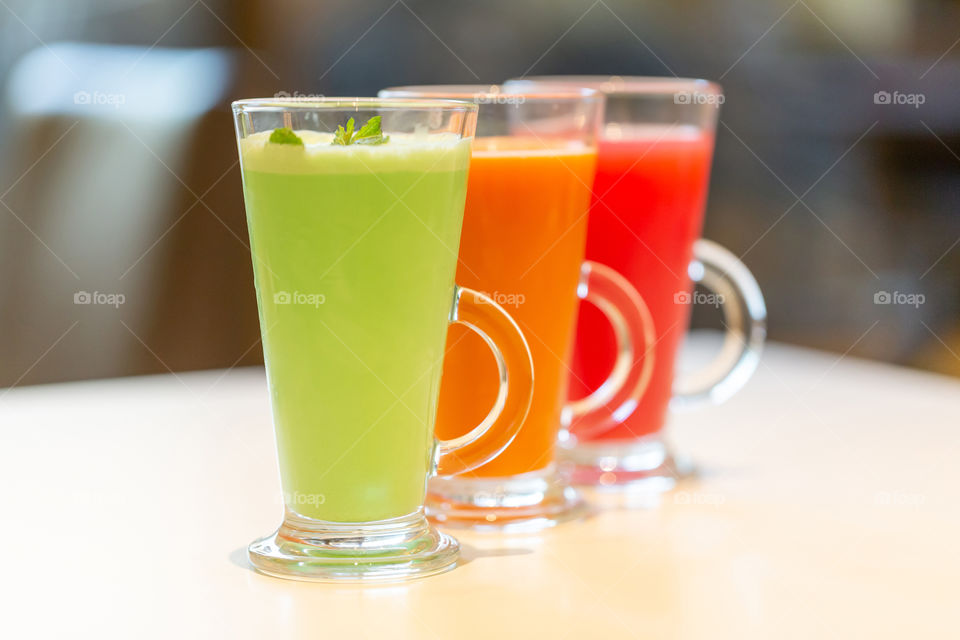 Three natural juices in a cafe