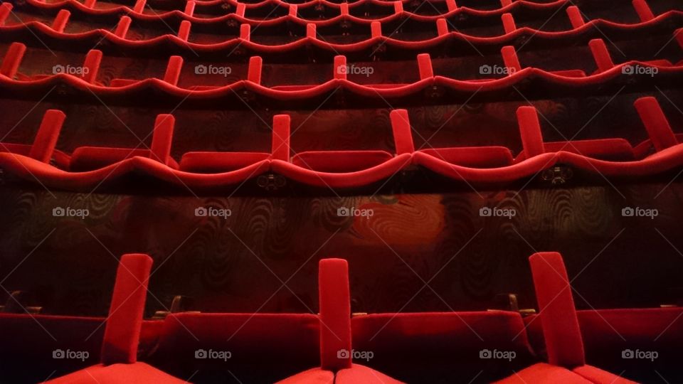 Seats in the Circle of the New Theatre, Oxford, England, before an evening performance of the musical Sunny Afternoon on a Saturday night in Winter