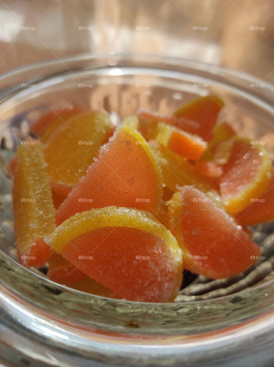 Fruit jelly in the form of citrus fruits close-up