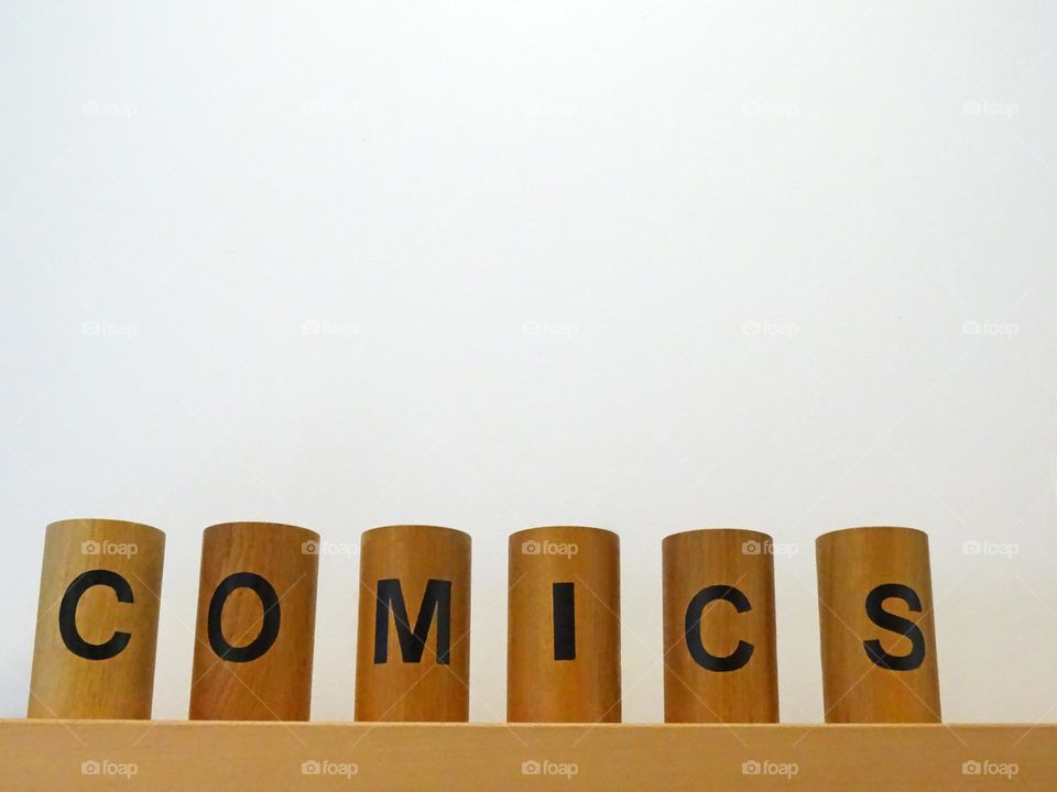 Comics organized cylinders and white copy space above