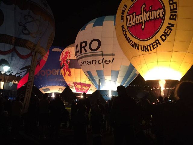 Hot air ballon show. They light up their flame on the rhythm of the music. Really super cool