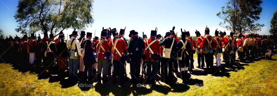 Soldiers . A line of reenactors for the war of 1812.