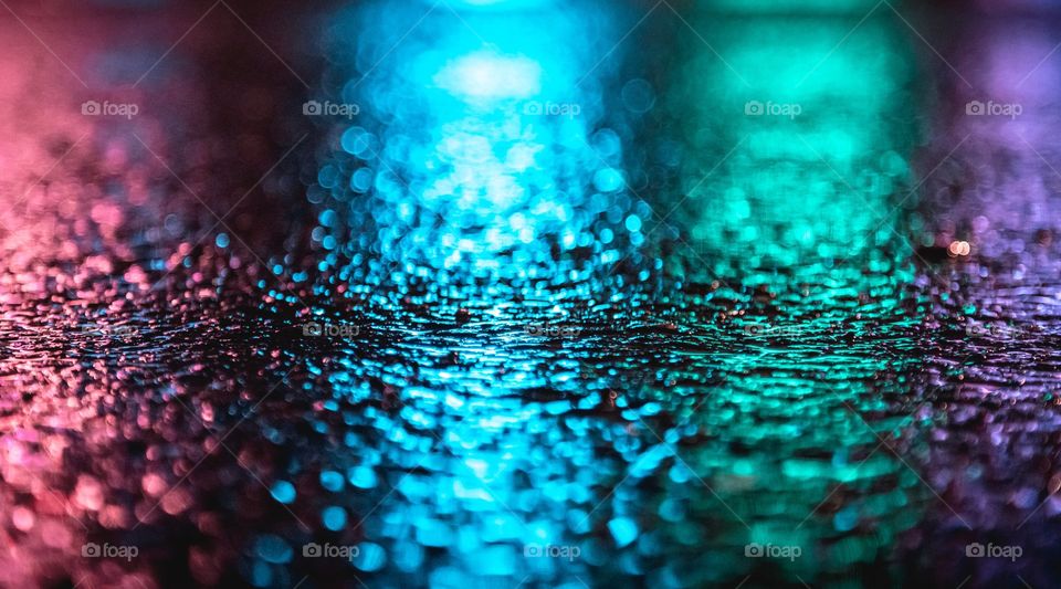 Neon Light Reflecting On Road