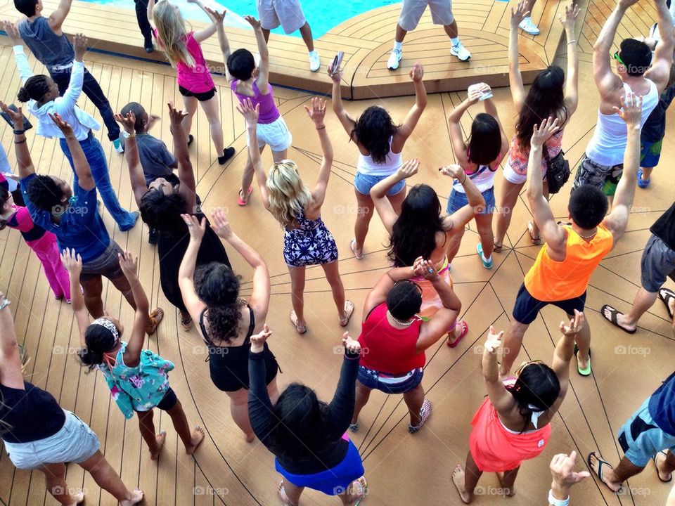 People dancing on cruise ship deck