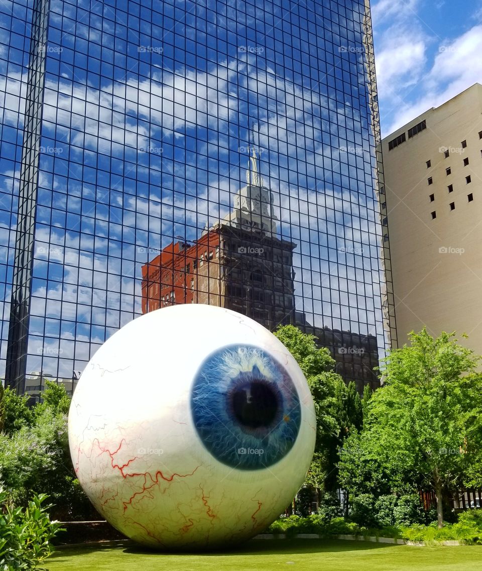 The Eyeball sculpture art in open park in Downtown Dallas