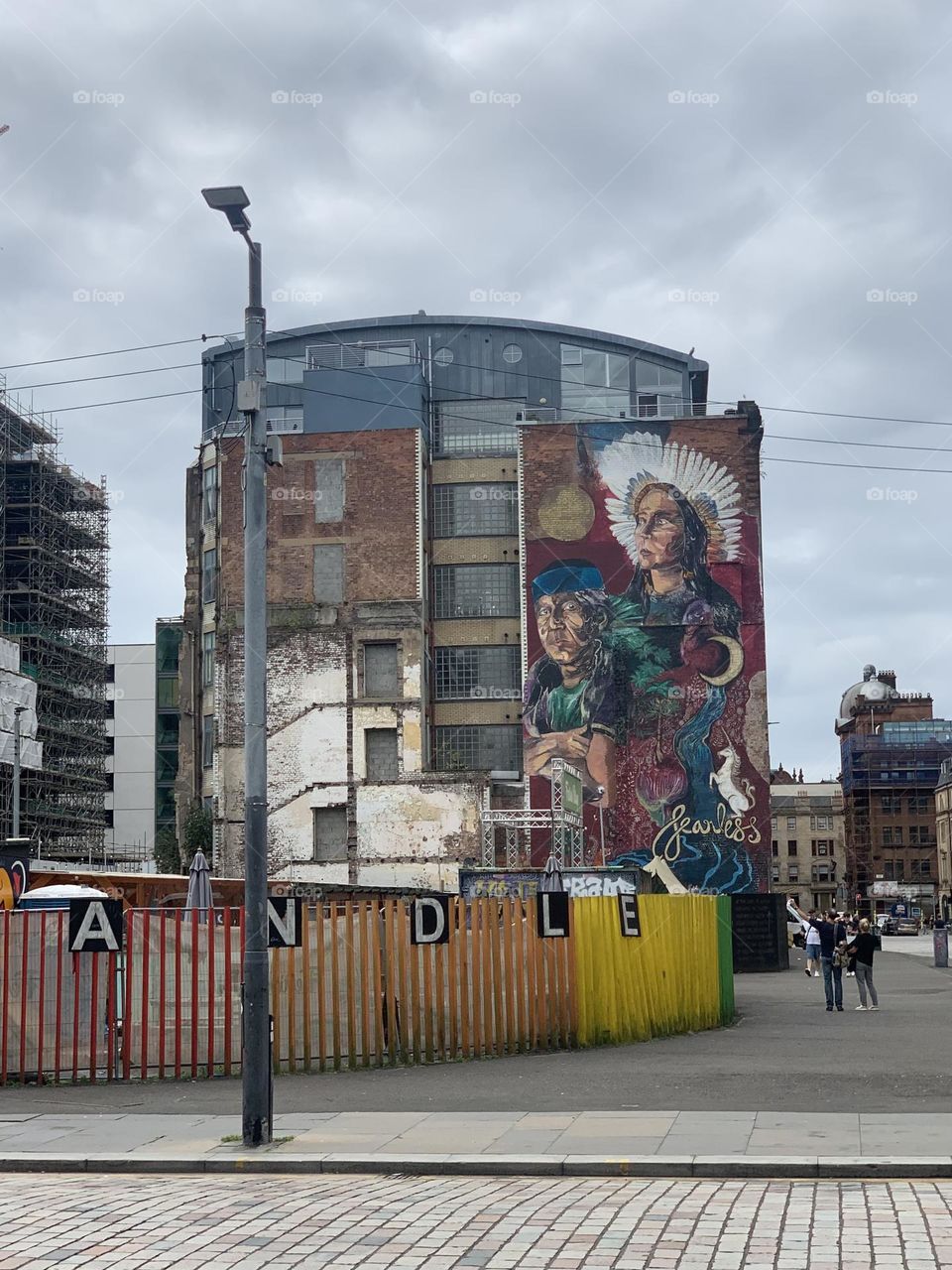 Cityscape with a view of a building and mural