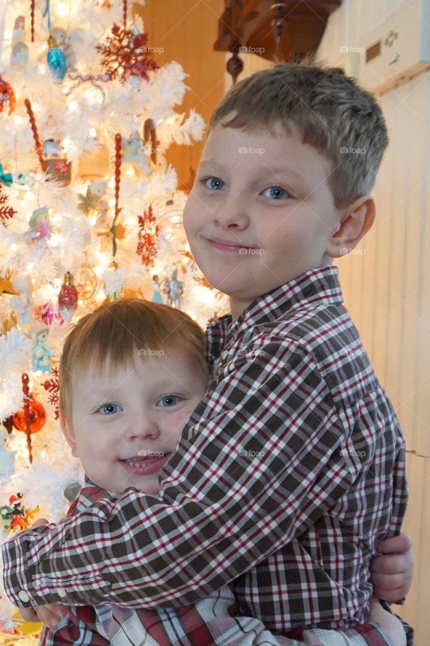 Mason and Evan by the Christmas tree 