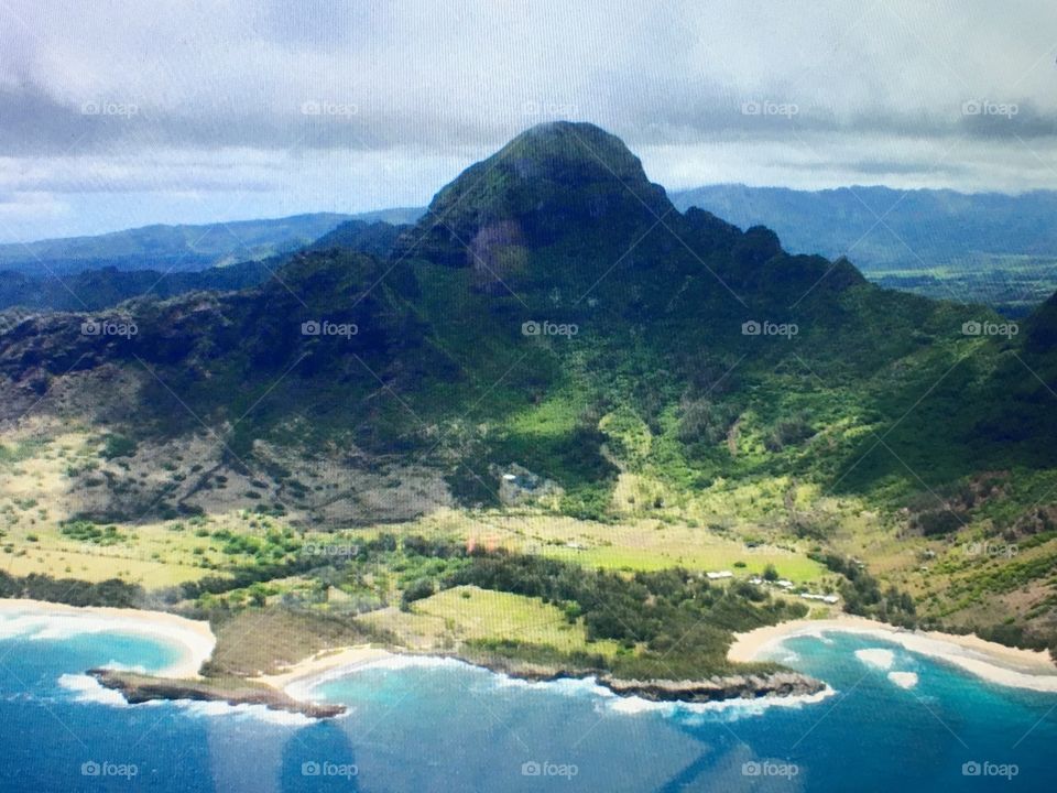 The tallest mountain on Kauai, Hawaii. Photo taken from propeller plane.
