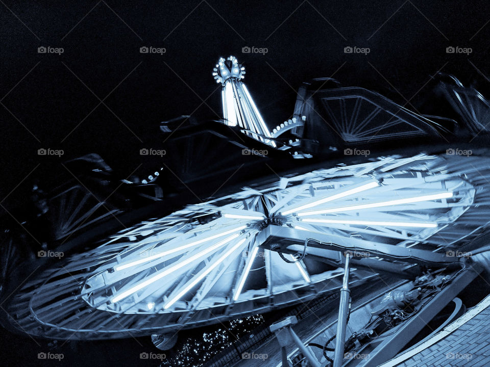 carnival ride and lights in black and white