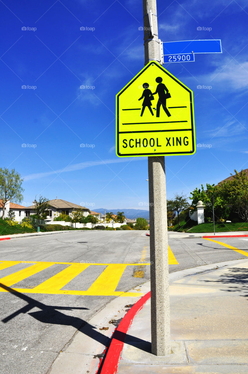 School crossing warning sign.