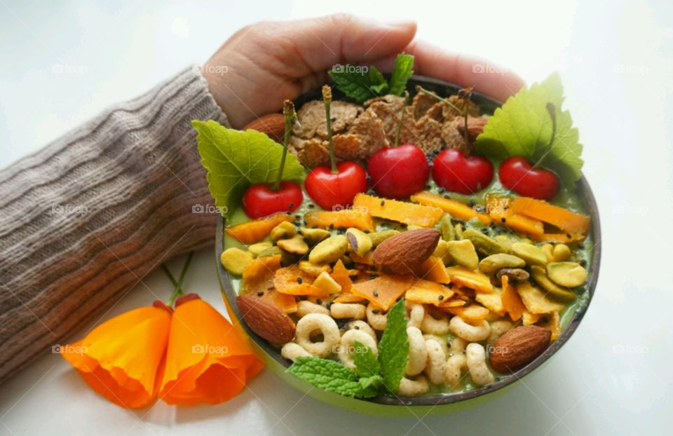 Fresh Fruit Smoothie Bowl - cheery, mango, banana, cereals,  seeds and nuts