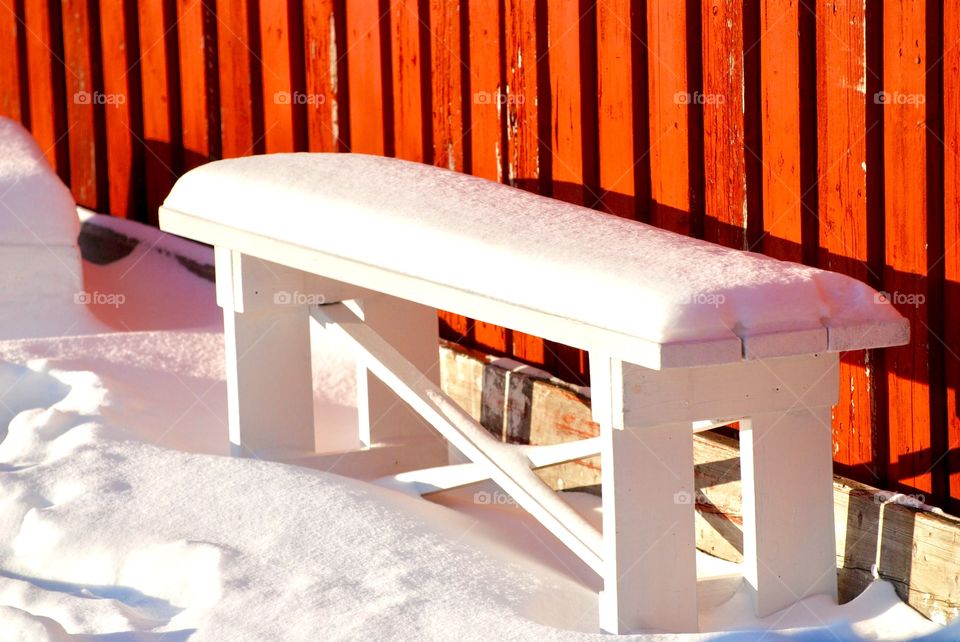 Bench snow and sun
