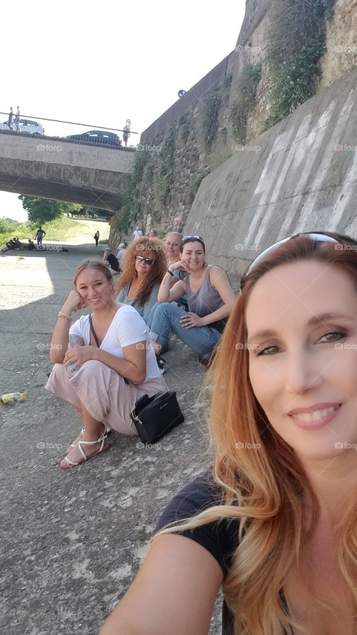 Girl time at the beautiful Arno in Florence Italy