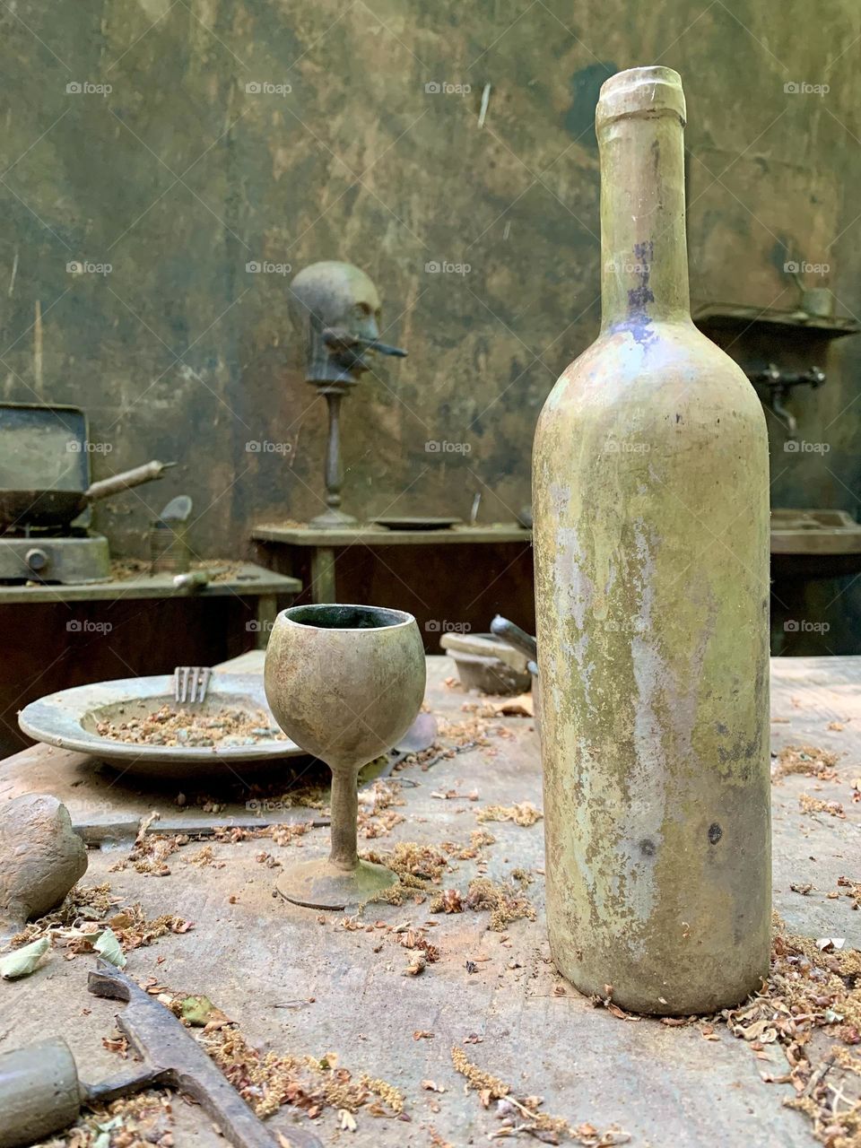 Daniel Spoerri's exciting artistic garden in Seggiano, Tuscany. Spoerri's Parisian room, here, reproduced by him and cast in bronze.