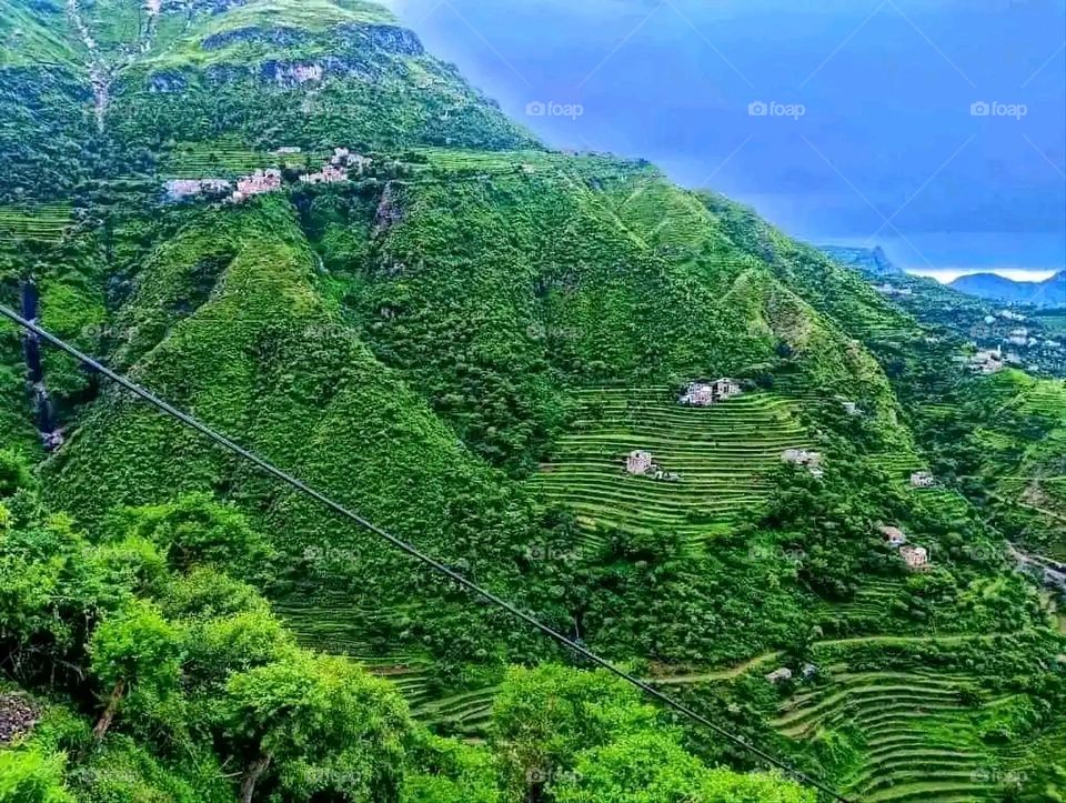 Glory be to God, the magnificent and picturesque view and the natural green trees are a view that is nothing more wonderful than it