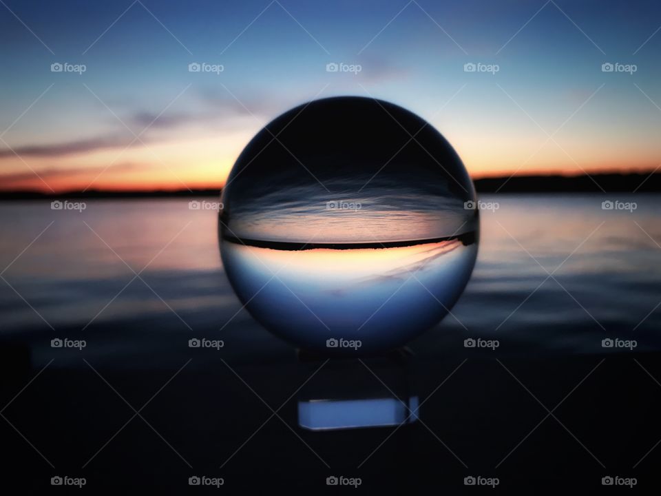 Sunset over Hamlin Lake through a lens ball—taken in Ludington, Michigan 