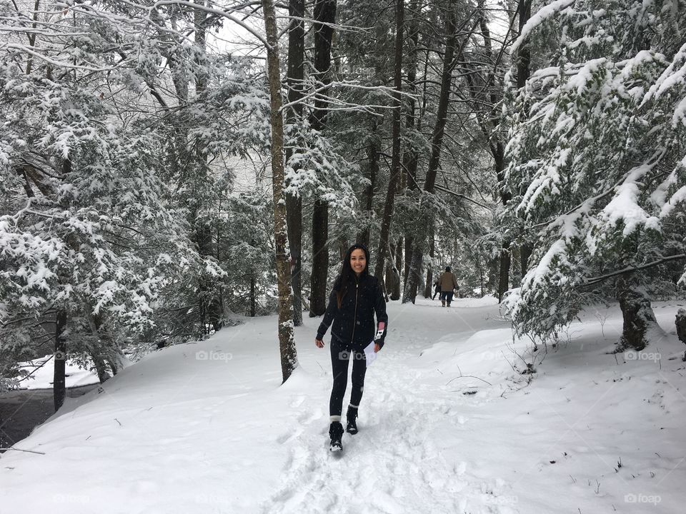 Girl walking in the snow 