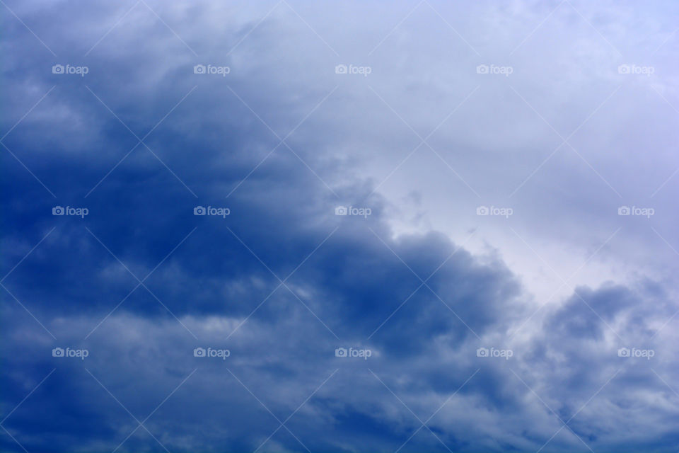 Blue sky with clouds.  Stormy sky.