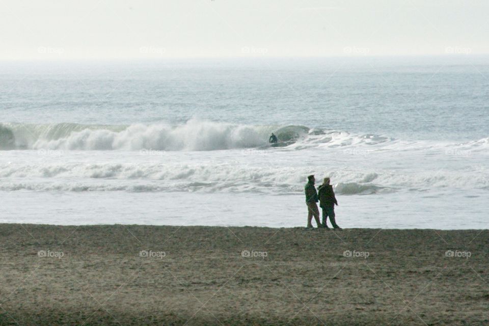 on the beach, surfer 