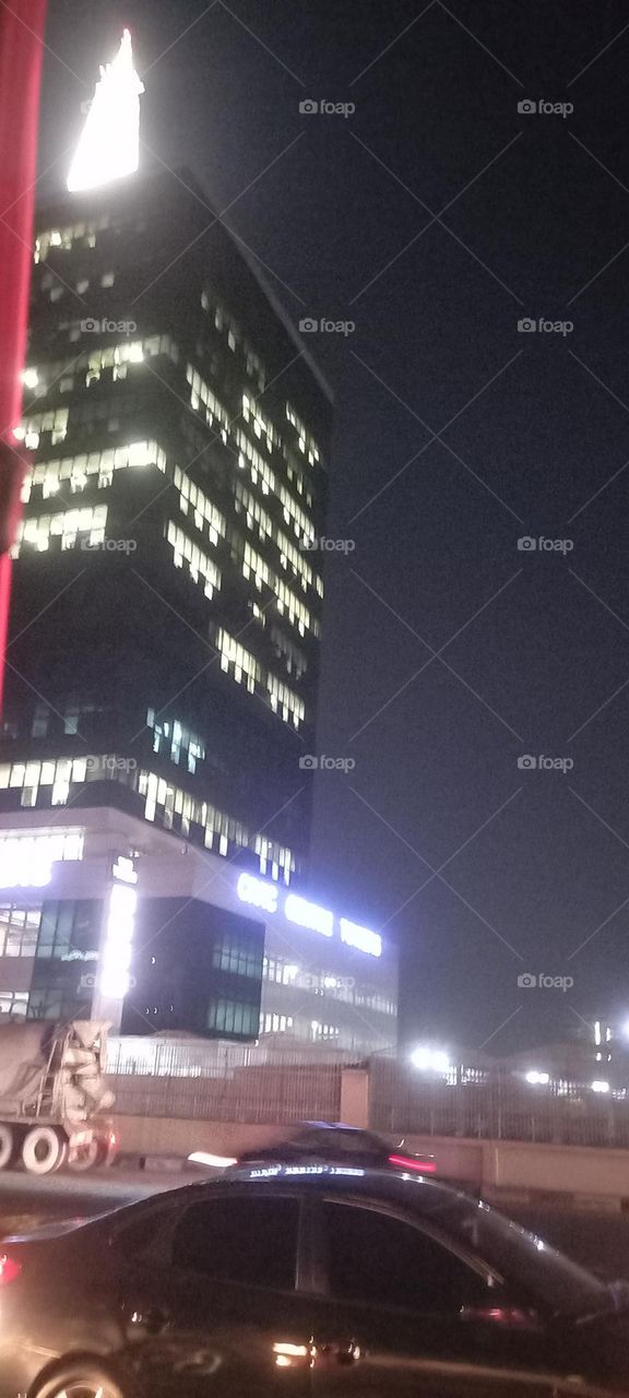 Twinkling windows , the beauty of evening light. Bask in the beauty of evening light with the view of light twinkling from these windows at night