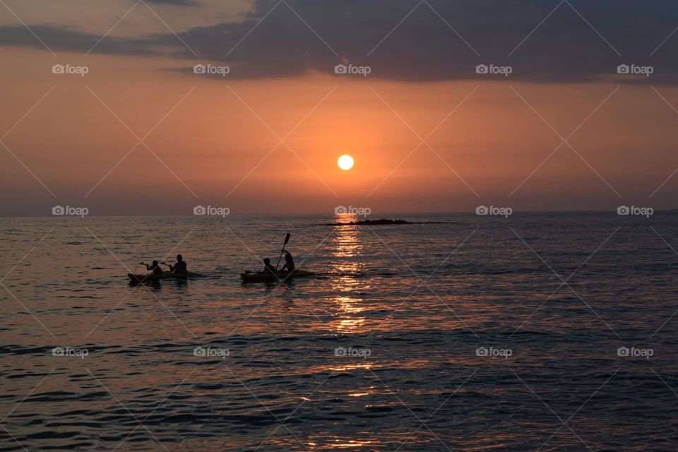 Greece Sunset beach summer. Greece summer sunset beach canoeing