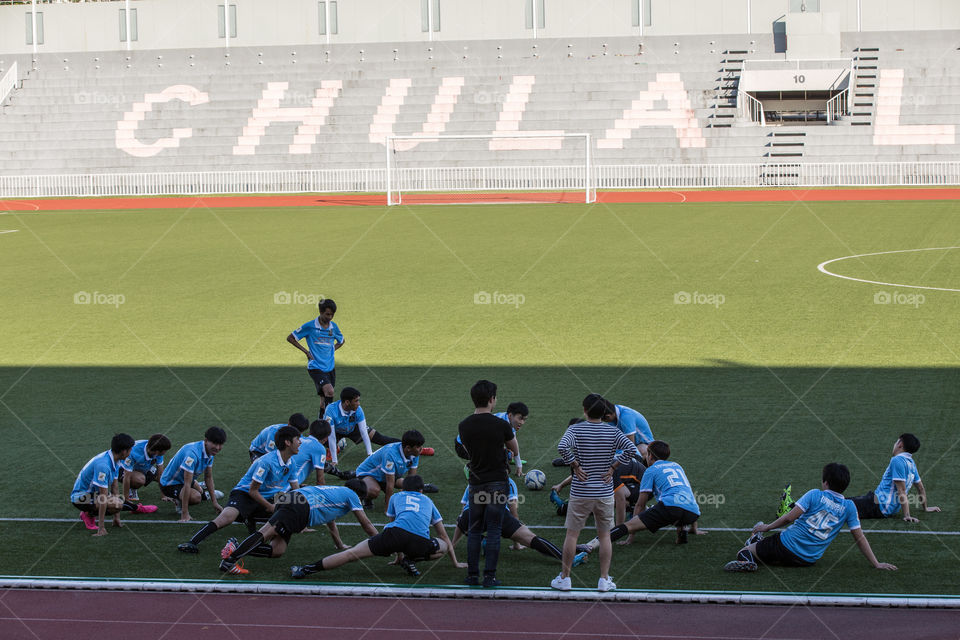 Football players  warm up