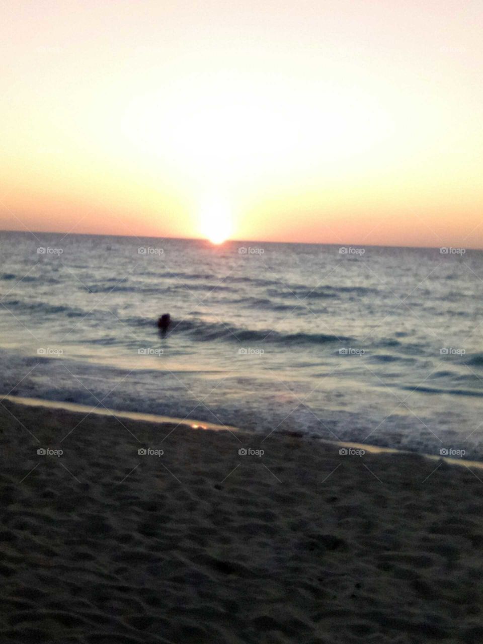 we enjoy the ocean an the sunset but must of all we enjoy the water to splash an have a lot of fun