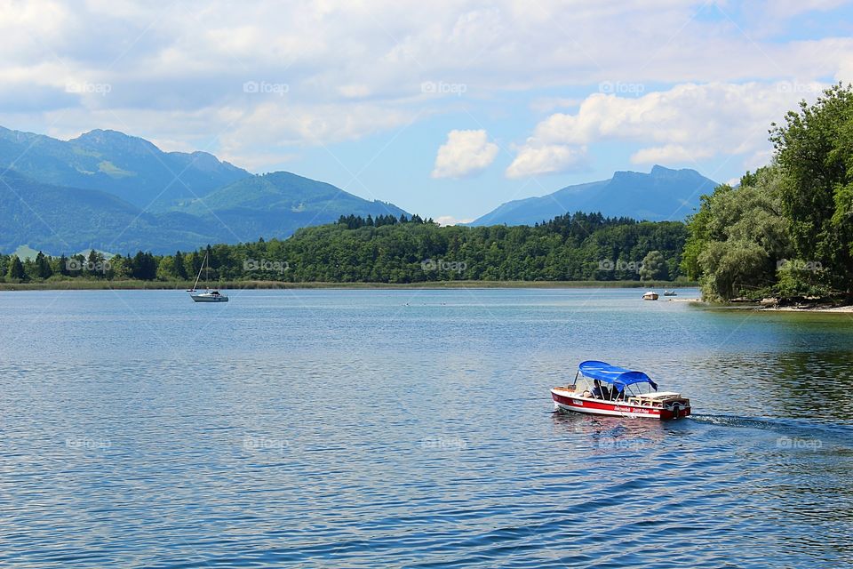 taking a small boat for a relaxing trip in the lake.