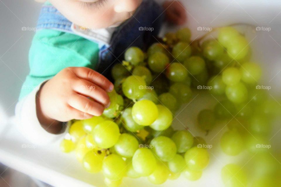 little boy, bunch of grapes, fun