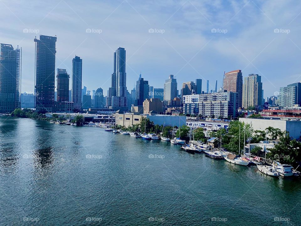 This glorious panorama photo comes to us from „Newtown Creek“ in LIC, Queens seen from atop the „Pulaski Bridge“ on a hot Indian summer day in September of 2023. Hypnotic Productions