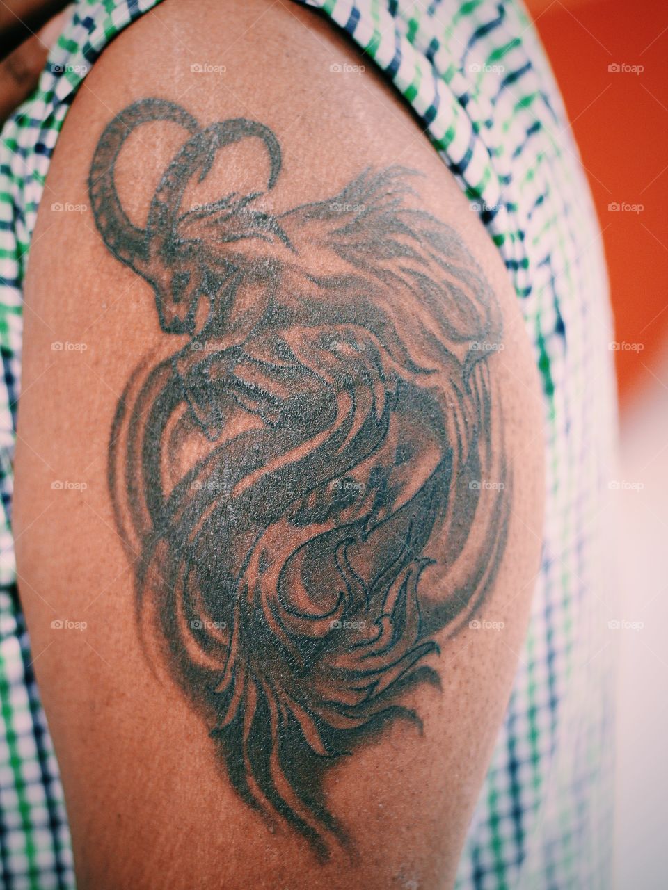 Taurus tattoo on arm 
