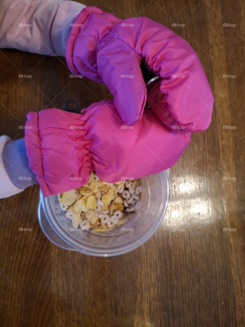 Eating Cereal with new mitts