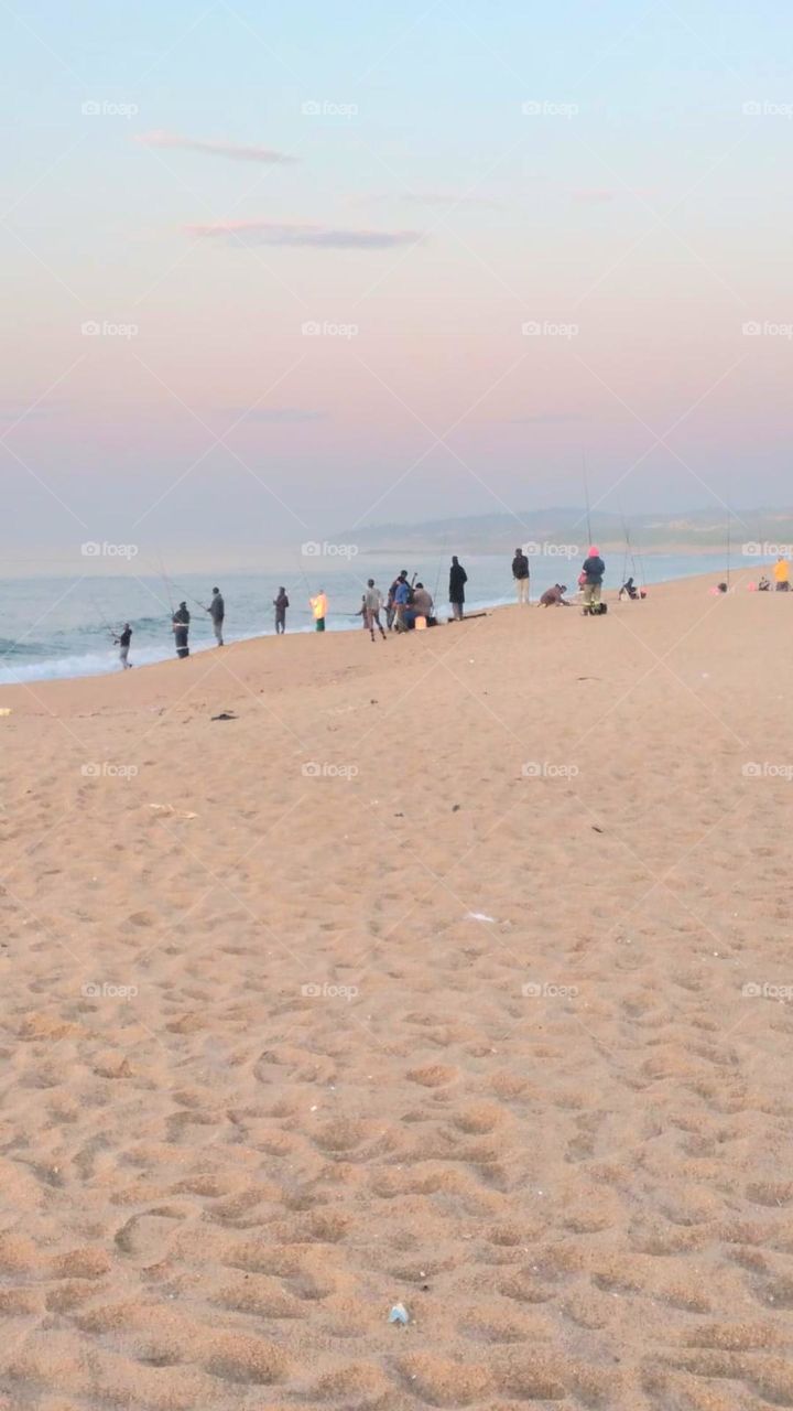 Fisherman on a beach