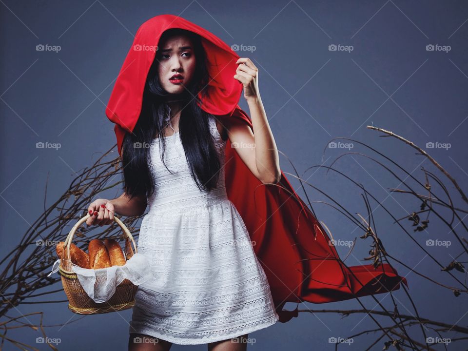 The little red riding hood running lost in the wood