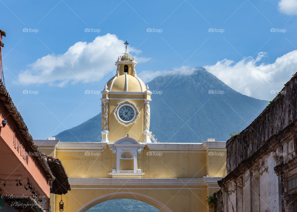Arch and volcano located in Antigua, Guatemala.