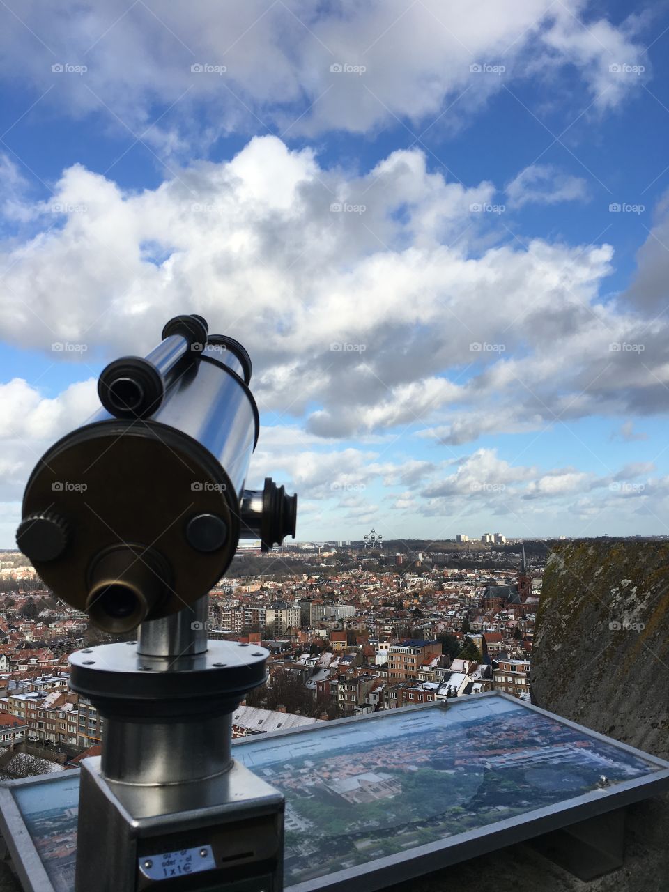 City sky and a pair of binoculars