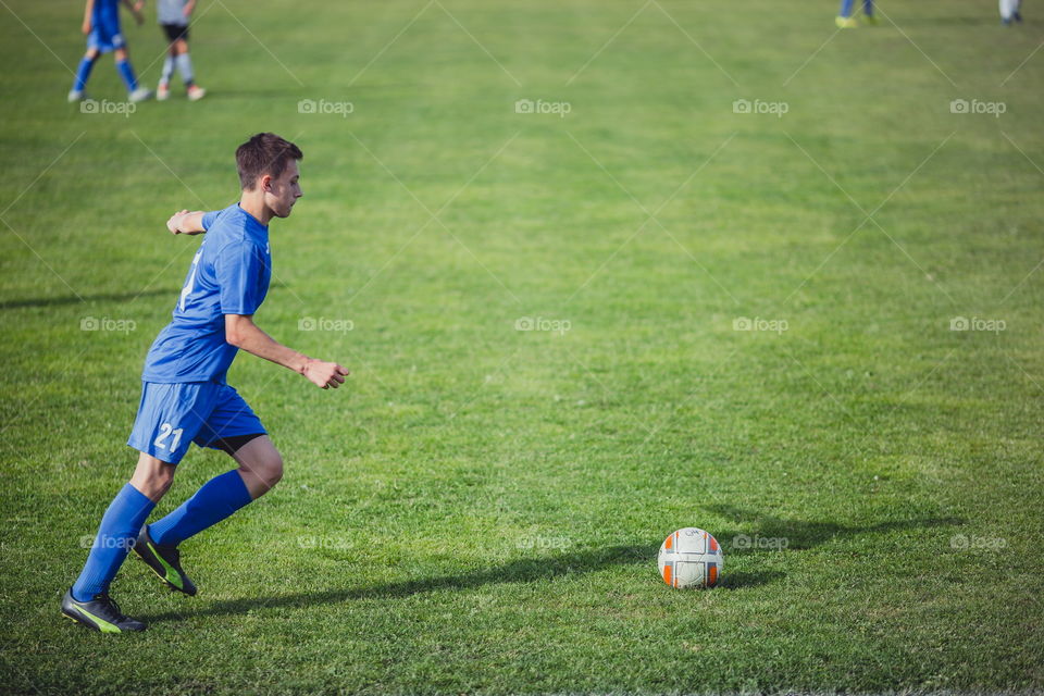 Football teen play 