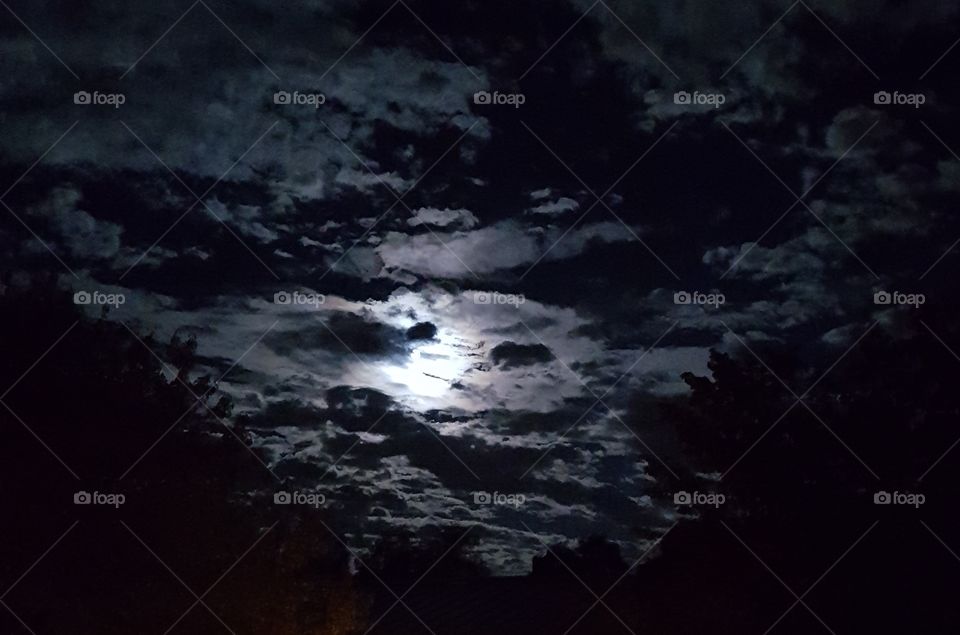 moonlight behind clouds