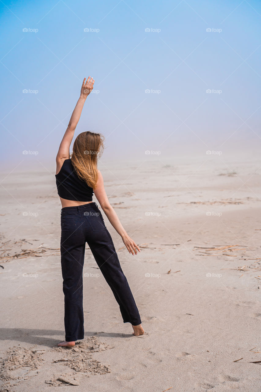 Joga on the beach on a summer morning.